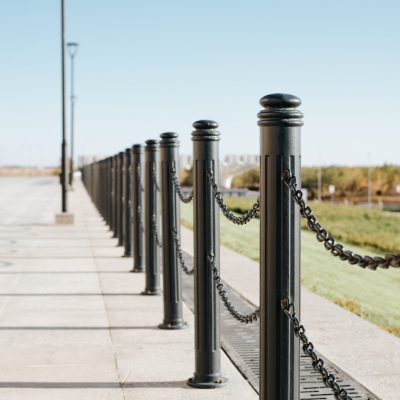 decorative-fence-black-steel-poles-with-a-chain-on-2023-11-27-05-05-21-utc (1)